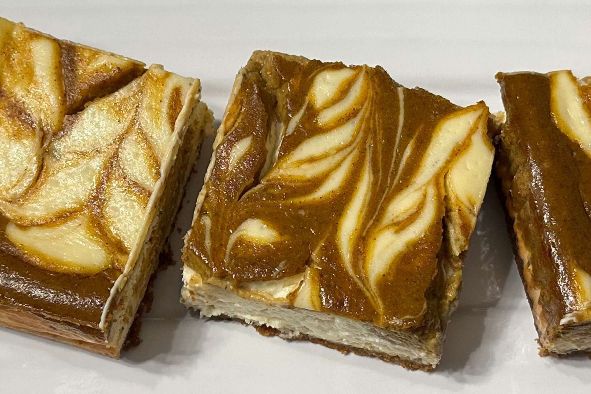 Pumpkin swirl cheesecake bars