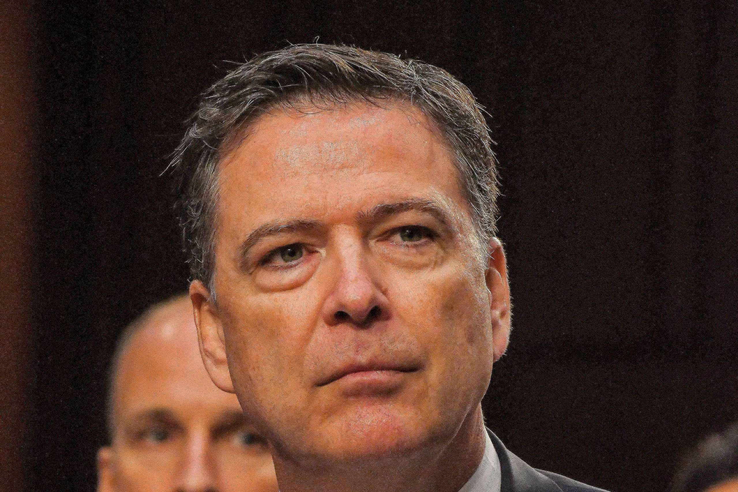 Comey declares innocence after court appearance on charges he threatened Trump